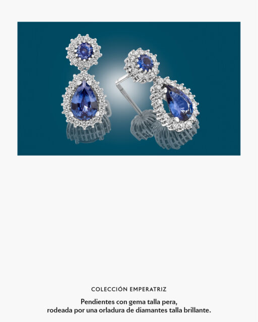 La silueta de estos pendientes se construye alrededor de una gema talla pera, envuelta por diamantes que multiplican los reflejos y aportan riqueza al conjunto. Zafiro, rubí o esmeralda transforman por completo su expresión, manteniendo intacta la fuerza del diseño.

Una creación que celebra las piedras preciosas desde una mirada decididamente contemporánea.

#PerodriJoyeros #ColecciónEmperatriz #AltaJoyería