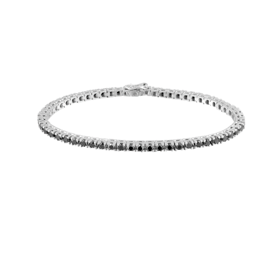 Joyas imprescindibles en tu joyero Pulsera de oro blanco con diamantes negros engastados en línea, diseño contemporáneo y elegante.